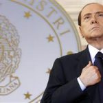 Then Italian Prime Minister Silvio Berlusconi looks on as he leads a news conference with French President Nicolas Sarkozy at Villa Madama in Rome in this April 26, 2011 file photo. REUTERS/Alessandro Bianchi/Files