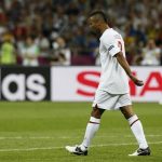 England's Ashley Cole reacts after missing a penalty during the penalty shoot-out in their Euro 2012 quarter-final soccer match against Italy at the Olympic Stadium in Kiev, June 24, 2012. REUTERS/Tony Gentile