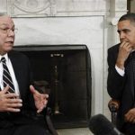 U.S. President Barack Obama listens to former Secretary of State Colin Powell (L) during their meeting in the Oval Office at the White House in Washington, December 1, 2010. REUTERS/Jim Young
