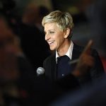 Ellen DeGeneres smiles as she talks to a reporter while arriving for the Mark Twain Prize ceremony in Washington, October 22, 2012. REUTERS/Jonathan Ernst
