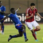 Gedo (R) of Egypt's Al-Ahly fights for the ball with Tosin Yunusa of Nigeria's Sunshine Stars during their African Champions League semi-final soccer match at the Military Stadium in Cairo October 21, 2012. REUTERS/Mohamed Abd El Ghany