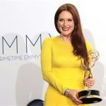 Actress Julianne Moore holds the Emmy award for outstanding lead actress in a miniseries or movie for "Game Change" at the 64th Primetime Emmy Awards in Los Angeles September 23, 2012. REUTERS/Mario Anzuoni