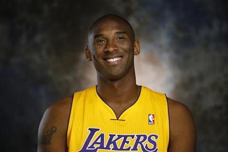Lakers guard Kobe Bryant smiles during an interview at NBA media day for the Los Angeles Lakers basketball team in Los Angeles October 1, 2012. REUTERS/Lucy Nicholson