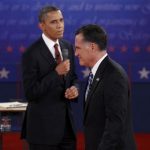 U.S. President Barack Obama (L) looks over at Republican presidential nominee Mitt Romney during the second U.S. presidential campaign debate in Hempstead, New York, October 16, 2012. REUTERS/Jim Young