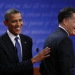 President Barack Obama (L) and Republican presidential nominee Mitt Romney share a laugh at the end of the first presidential debate in Denver October 3, 2012. REUTERS/Jim Bourg