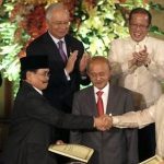 Philippines and Muslim rebels sign key peace plan