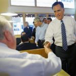 Republican presidential nominee Mitt Romney greets diners at First Watch cafe, where he picked up some food, in Cincinnati, Ohio October 25, 2012. REUTERS/Brian Snyder