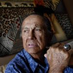 American Indian activist Russell Means poses for a portrait at his home in Scottsdale, Arizona, in this October 28, 2011 file photo. REUTERS/Joshua Lott/Files