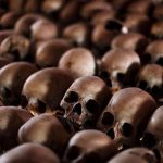 The skulls of Rwandan victims rest on shelves at a genocide memorial inside the church at Ntarama just outside the capital Kigali, August 6, 2010. REUTERS/Finbarr O'Reilly
