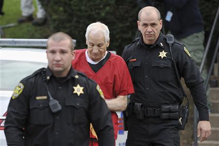 Former Penn State assistant football coach Jerry Sandusky arrives at the Centre County Courthouse for sentencing in his child sex abuse case in Bellefonte, Pennsylvania October 9, 2012. REUTERS/Pat Little