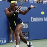 Serena Williams of the U.S. hits a return to Victoria Azarenka of Belarus during their women's singles finals match at the U.S. Open tennis tournament in New York September 9, 2012. REUTERS/Eduardo Munoz