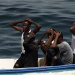 Suspected pirates place their hands on their heads as they are arrested by marines from NATO's Turkish frigate Gediz in the Gulf of Aden July 24, 2009. REUTERS/Turkish Chief of Staff