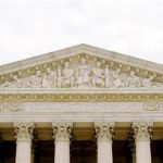 The front of the U.S. Supreme Court which reads 'Equal Justice Under Law' is seen in Washington July 19, 2005. UNICS REUTERS/Larry Downing