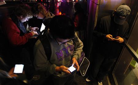 People congregate in front of a building that still has wireless internet access in the aftermath of Hurricane Sandy in New York People congregate in front of a building that still has wireless internet access in the aftermath of Hurricane Sandy in New York October 30, 2012. REUTERS/Brendan McDermid