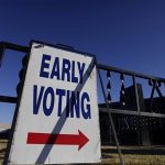 A voting sign is displayed outside the Gila County Recorders office during early voting in Globe, Arizona October 26, 2012. Election Day is November 6. REUTERS/Joshua Lott