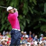 Tiger Woods of the U.S. tees off on the first hole during the third round of Malaysia's Asia Pacific Classic golf tournament in Kuala Lumpur October 27, 2012. REUTERS/Bazuki Muhammad