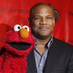 Voice actor Kevin Clash arrives with the puppet Elmo for the 2010 Peabody Award ceremony at the Waldorf Astoria in New York in this May 17, 2010 file photo. REUTERS/Lucas Jackson/Files
