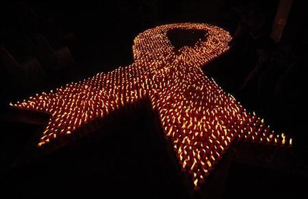 About 2880 candles are seen lit during a World AIDS Day event in Jakarta December 1, 2009. REUTERS/Dadang Tri