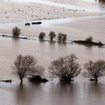 Floods in UK: Travel disrupted as storms head north