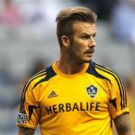 David Beckham of the L.A. Galaxy warms up before his team faces the Vancouver Whitecaps during their MLS soccer match in Vancouver, British Columbia July 18, 2012. REUTERS/Ben Nelms