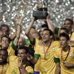 Brazil's soccer players celebrate with the trophy after winning the Clasico de Las Americas international friendly match against Argentina in Buenos Aires November 21, 2012. REUTERS/Martin Acosta