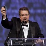 Will Ferguson toasts to the audience during his speech after winning the Scotiabank Giller Prize for his novel "419" at the Ritz-Carlton in Toronto October 30, 2012. The winner of this annual literary prize is awarded $50,000 for the best Canadian novel or short story collection published in English. REUTERS/Matthew Sherwood