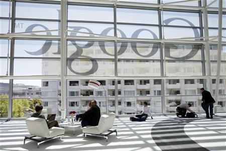 Attendees sits in front of a Google logo during Google I/O Conference at Moscone Center in San Francisco, California June 28, 2012. REUTERS/Stephen Lam