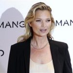 British model Kate Moss poses during the launch of the new Mango 2012 collection in London January 24, 2012. REUTERS/Stefan Wermuth