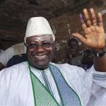 Sierra Leone's President Ernest Bai Koroma waves to supporters after voting in the capital Freetown November 17, 2012. REUTERS/Joe Penney