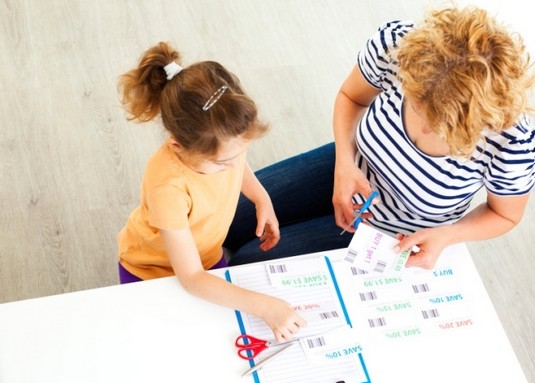 mother and daughter couponing-main 6 Ways to Teach Your Kids Money Management