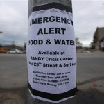 A sign posted on a lamppost alerts people to emergency food and water in Coney Island, New York, November 2, 2012. REUTERS/Brendan McDermid