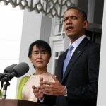 U.S. President Barack Obama speaks to the media alongside Myanmar's opposition leader Aung San Suu Kyi at her residence in Yangon November 19, 2012. REUTERS/Jason Reed