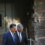 Republican presidential nominee Mitt Romney leaves the home of Reverend Billy Graham (not pictured) with Graham's son Franklin (R), in Montreat, North Carolina October 11, 2012. REUTERS/Shannon Stapleton