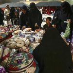 File photo of veiled women browsing at the Riyadh Heritage and Culture Festival in Riyadh late April 24, 2009. REUTERS/Fahad Shadeed