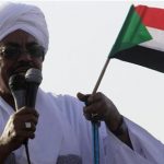 Sudan's President Omar Hassan al-Bashir addresses the crowd after arriving at Khartoum Airport September 28, 2012. REUTERS/Mohamed Nureldin Abdallah
