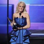 Carrie Underwood accepts the award for favorite country album for "Blown Away" at the 40th American Music Awards in Los Angeles, California, November 18, 2012. REUTERS/Danny Moloshok