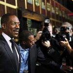 Actor Eddie Murphy (L) poses as he arrives for the taping of the Spike TV special tribute "Eddie Murphy: One Night Only" at the Saban theatre in Beverly Hills, California November 3, 2012. The program airs November 14. REUTERS/Mario Anzuoni