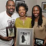Filmmaker Byron Hurt is pictured with his mother, Frances Hurt, and sister, Taundra Hurt, holding family photos of Hurt's father, Jackie Hurt, who died in 2007 at age 64 as a result of pancreatic cancer in this undated handout photo obtained by Reuters December 21, 2012. REUTERS/Bryon Hurt/Handout