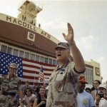 FILE - In this April 22, 1991 file photo, General H. Norman Schwarzkopf waves to the crowd after a military band played a song in his honor at welcome home ceremonies at MacDill Air Force Base in Tampa, Fla. Schwarzkopf died Thursday, Dec. 27, 2012 in Tampa, Fla. He was 78. (AP Photo/Lynne Sladky, File)