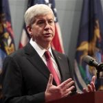 Michigan Governor Rick Snyder holds a news conference in Lansing, Michigan December 11, 2012. REUTERS/Rebecca Cook