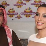 US celebrity Kim Kardashian (R) poses with Kuwaiti business man Ehab al-Aradi (L), during the opening of a branch of the American franchise 'Millions of Milkshakes' at the Avenues Mall in Kuwait City on November 29, 2012. AFP PHOTO / YASSER AL-ZAYYAT (Photo credit should read YASSER AL-ZAYYAT/AFP/Getty Images)