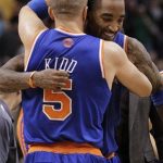 New York Knicks' Jason Kidd (5) celebrates with teammate J.R. Smith after Smith hit a game-winning basket against the Phoenix Suns during the second half of an NBA basketball game on Wednesday, Dec. 26, 2012, in Phoenix. The Knicks won 99-97. (AP Photo/Matt York)
