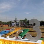 Workers set up a stage as preparations are underway for the country's first ever public New Year's countdown celebration, at Myoma grounds in Yangon, Myanmar, Monday, Dec. 31, 2012. (AP Photo/Khin Maung Win)