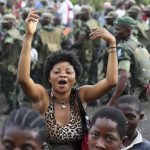 People dance to celebrate government army FARDC soldiers return to Goma December 3, 2012. REUTERS/Goran Tomasevic