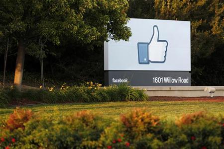 The sun sets on the entrance sign at Facebook's headquarters in Menlo Park the night before its IPO launch The sun sets on the entrance sign at Facebook's headquarters in Menlo Park, California, the night before the company's IPO launch, May 17, 2012. REUTERS/Beck Diefenbach