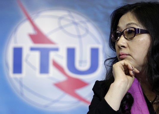Yafang chairwoman of the board of Huawei listens to a speech before receiving a World Telecommunication and Information Society Award ITU in Geneva Sun Yafang, chairwoman of the board of Huawei Technologies listens to a speech before receiving a World Telecommunication and Information Society Award at the International Telecommunication Union (ITU) headquarters in Geneva May 16, 2012. ITU celebrates World Telecommunication and Information Society Day, which marks the Union's 147th anniversary this year, by awarding three women for their leadership and dedication towards promoting information and communication technologies. REUTERS/Denis Balibouse (SWITZERLAND - Tags: BUSINESS TELECOMS POLITICS HEADSHOT)