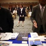 People participate in a job fair in New York June 11, 2012. REUTERS/Eric Thayer