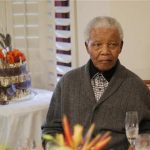 Former South African president Nelson Mandela looks on as he celebrates his birthday at his house in Qunu, Eastern Cape July 18, 2012. REUTERS/Siphiwe Sibeko