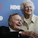 FILE - In a Tuesday, June 12, 2012 file photo, former President George H.W. Bush, and his wife, former first lady Barbara Bush, arrive for the premiere of HBO's new documentary on his life near the family compound in Kennebunkport, Maine. Bush spokesman Jim McGrath said Wednesday, Dec. 26. 2012 that doctors at the Houston hospital where Bush has been treated for a month remain cautiously optimistic that he will recover. Still, no discharge date has been set, and McGrath says that doctors are being cautious because at Bushs age sometimes issues crop up that are beyond anybodys ability to discern or foretell.(AP Photo/Charles Krupa, File)