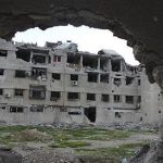 A general view of buildings, damaged by what activists said were missiles fired by a Syrian Air Force fighter jet of forces loyal to Syrian President Bashar al-Assad, at Zamalka near Damascus December 19, 2012. REUTERS/Karm Seif/Shaam News Network/Handout
